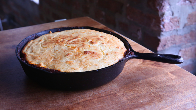 Illustration for article titled Make chili-cornbread skillet pie, a hearty dinner in a single pan